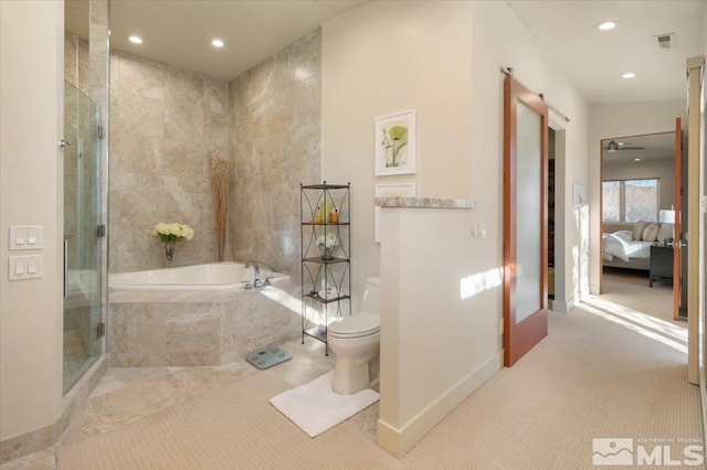 bathroom featuring a garden tub, a shower stall, recessed lighting, toilet, and ensuite bathroom