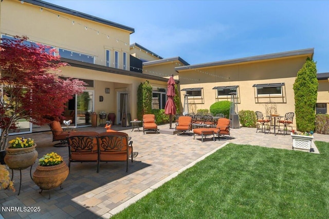 view of patio with an outdoor hangout area