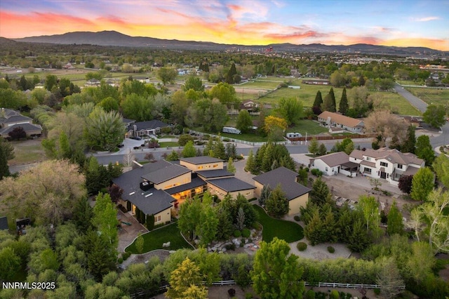 10064 Dixon Ln, Reno, NV 89511 - aerial view at dusk of a mountain view and a residential view