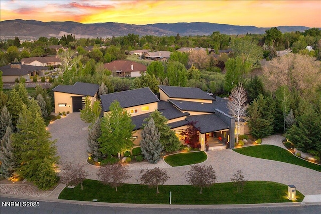 10064 Dixon Ln, Reno, NV 89511 - aerial view at dusk of a mountain view and a residential view