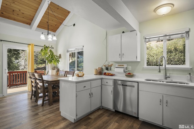 1348 Tirol Dr, Incline Village, NV 89451 - kitchen with dishwasher, a sink, a peninsula, light countertops, and beam ceiling