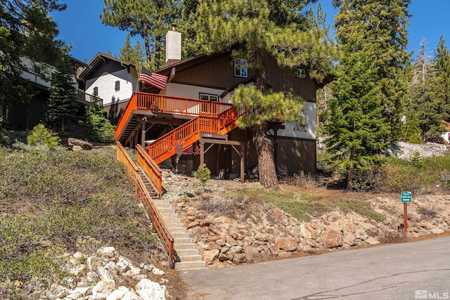 1348 Tirol Dr, Incline Village, NV 89451 - view of yard featuring stairway and a deck