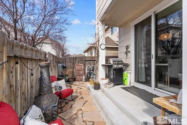 3585 Herons Cir, Reno, NV 89502 - view of patio with grilling area and fence