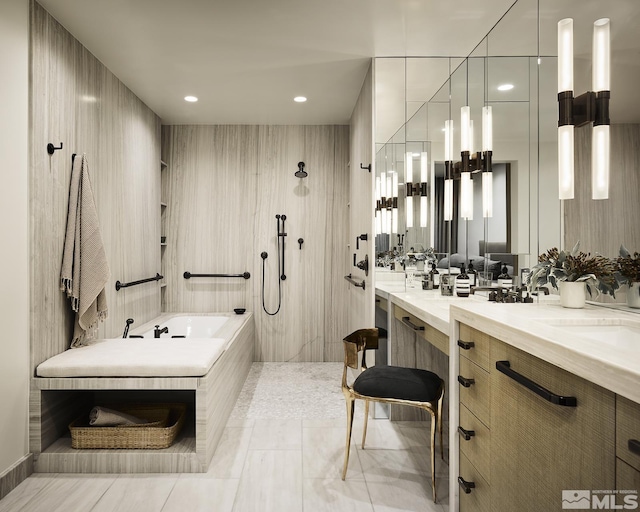 9 Beach Club Dr Unit 116, Stateline, NV 89449 - bathroom featuring walk in shower, vanity, a garden tub, and recessed lighting