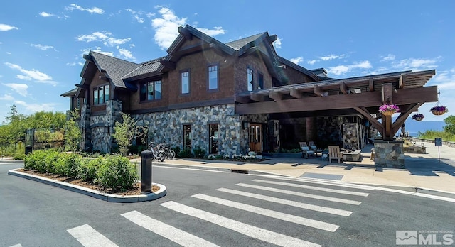 9 Beach Club Dr Unit 116, Stateline, NV 89449 - rear view of property featuring stone siding