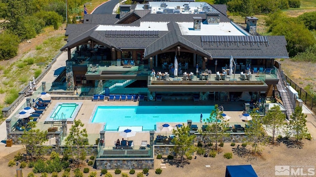 9 Beach Club Dr Unit 116, Stateline, NV 89449 - back of property with a community pool and a chimney
