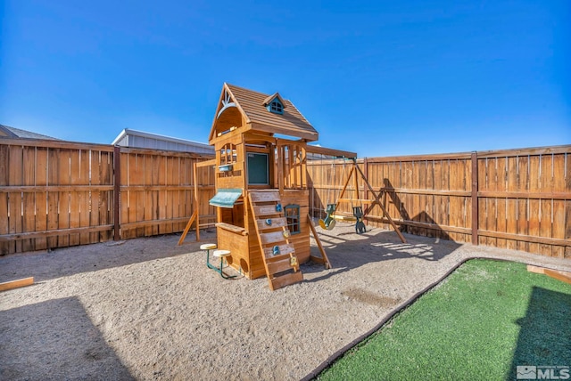 696 Raptor Way, Fernley, NV 89408 - view of playground with a fenced backyard