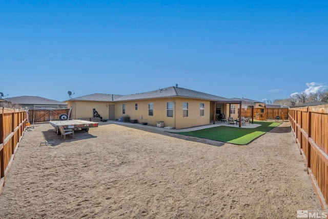 696 Raptor Way, Fernley, NV 89408 - rear view of property featuring a patio and a fenced backyard