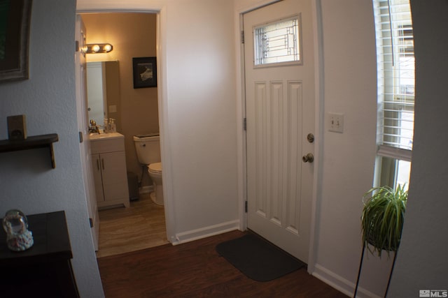 1754 Pinewood Dr Unit 14, Minden, NV 89423 - foyer featuring dark wood-style flooring and baseboards
