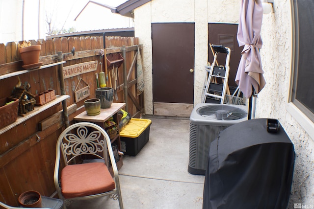 1754 Pinewood Dr Unit 14, Minden, NV 89423 - view of patio with central AC and fence