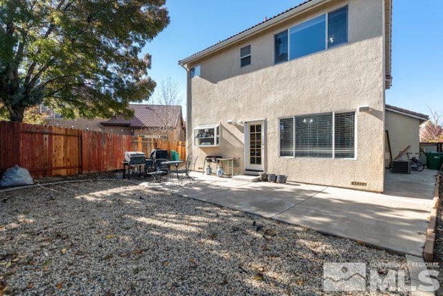 rear view of house with fence, a patio area, stucco siding, crawl space, and entry steps