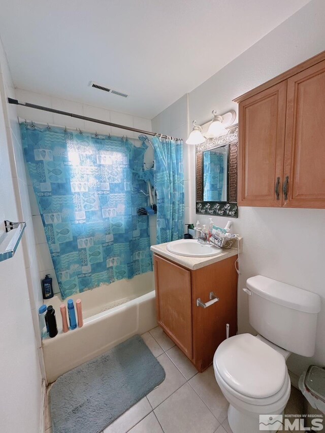 695 York Way, Sparks, NV 89431 - bathroom with tile patterned flooring, toilet, shower / bathtub combination with curtain, and vanity