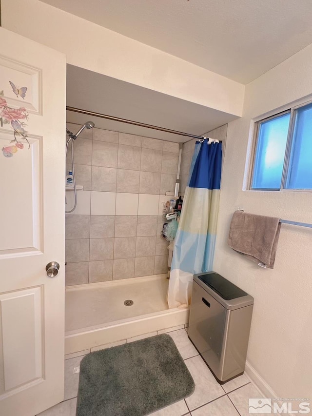 695 York Way, Sparks, NV 89431 - full bath with tile patterned flooring, a stall shower, and baseboards