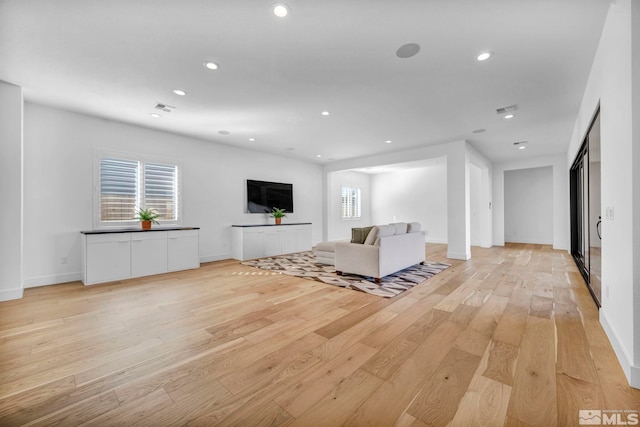 2277 White Clay Dr, Reno, NV 89521 - living room with light wood-type flooring, recessed lighting, and baseboards