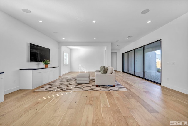 2277 White Clay Dr, Reno, NV 89521 - living room with light wood-type flooring, recessed lighting, and baseboards