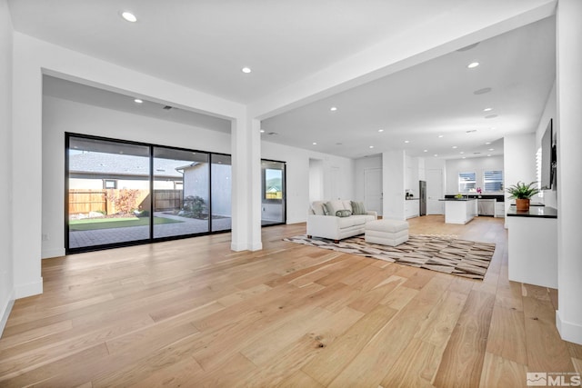 2277 White Clay Dr, Reno, NV 89521 - living room featuring light wood-style flooring and recessed lighting