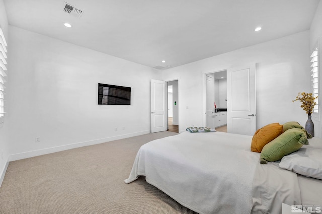 2277 White Clay Dr, Reno, NV 89521 - bedroom with recessed lighting, light colored carpet, and baseboards