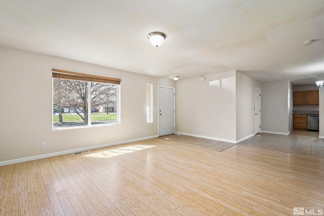 1342 Cahi Cir, Gardnerville, NV 89460 - spare room with baseboards, light wood finished floors, and a smoke detector