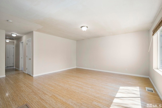 1342 Cahi Cir, Gardnerville, NV 89460 - unfurnished room with light wood-type flooring, baseboards, and a smoke detector