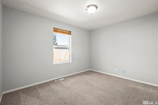 1342 Cahi Cir, Gardnerville, NV 89460 - carpeted spare room featuring baseboards
