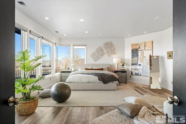 10241 Zuni Ridge Trl, Reno, NV 89511 - bedroom with wood finished floors, recessed lighting, and baseboards