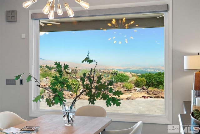 10241 Zuni Ridge Trl, Reno, NV 89511 - dining space with a chandelier