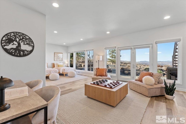 10241 Zuni Ridge Trl, Reno, NV 89511 - living room with light wood-type flooring and recessed lighting