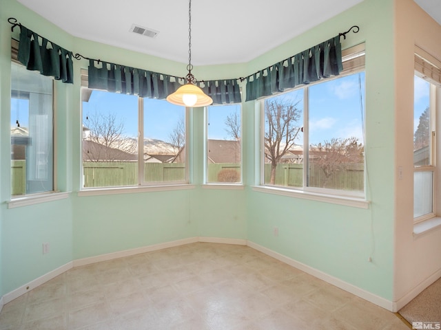 2976 Del Rio Ln, Minden, NV 89423 - unfurnished dining area featuring baseboards