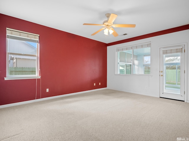 2976 Del Rio Ln, Minden, NV 89423 - unfurnished room with healthy amount of natural light, carpet, ceiling fan, and baseboards