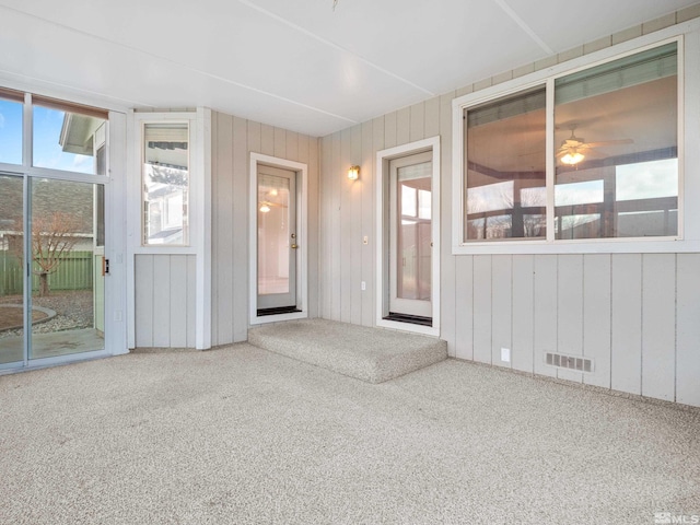 2976 Del Rio Ln, Minden, NV 89423 - unfurnished sunroom featuring healthy amount of natural light and ceiling fan