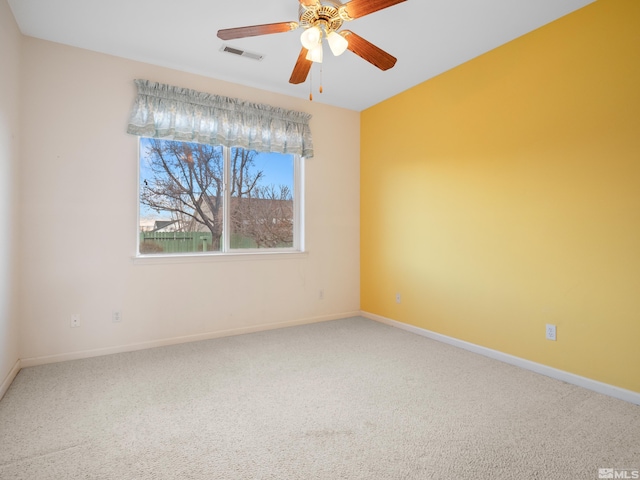 2976 Del Rio Ln, Minden, NV 89423 - empty room with carpet floors, a ceiling fan, and baseboards