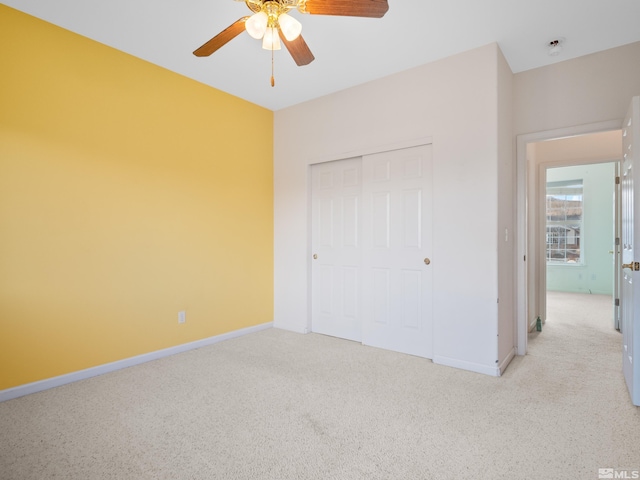 2976 Del Rio Ln, Minden, NV 89423 - unfurnished bedroom with light colored carpet, baseboards, and a closet