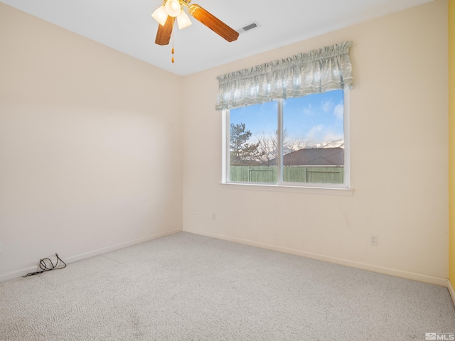 2976 Del Rio Ln, Minden, NV 89423 - unfurnished room with carpet flooring, a ceiling fan, and baseboards