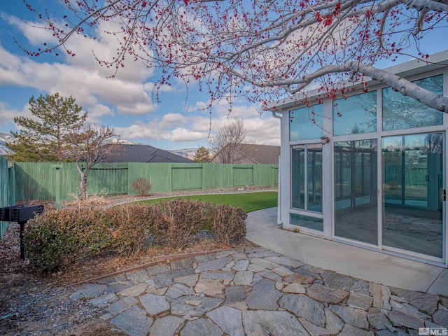 2976 Del Rio Ln, Minden, NV 89423 - view of patio with a fenced backyard and a sunroom