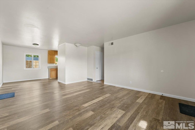 1180 Xman Way, Sparks, NV 89431 - unfurnished living room with wood finished floors and baseboards