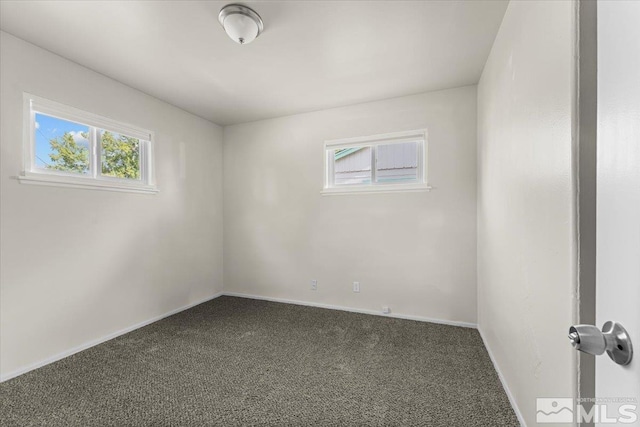 1180 Xman Way, Sparks, NV 89431 - empty room featuring carpet flooring and baseboards