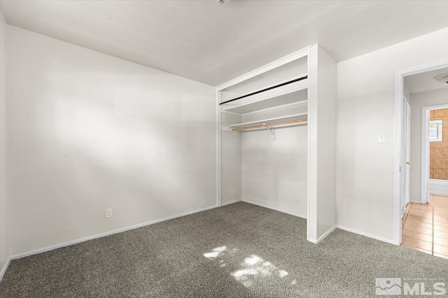 1180 Xman Way, Sparks, NV 89431 - unfurnished bedroom featuring carpet floors, a closet, and baseboards