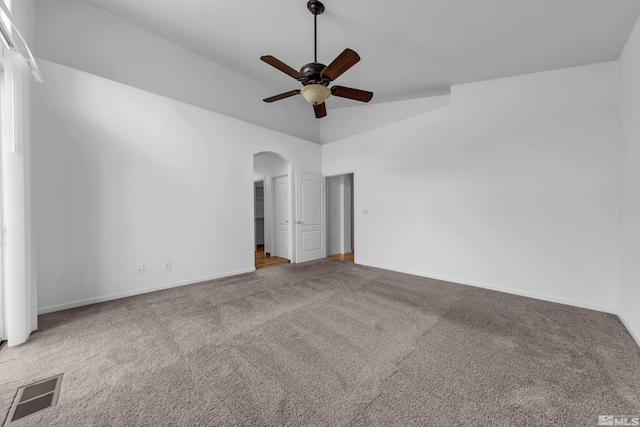 6841 Talmedge Cir, Sparks, NV 89436 - unfurnished room with a ceiling fan, carpet flooring, arched walkways, baseboards, and high vaulted ceiling