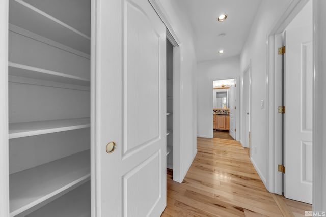 6841 Talmedge Cir, Sparks, NV 89436 - hallway with recessed lighting and light wood-style flooring