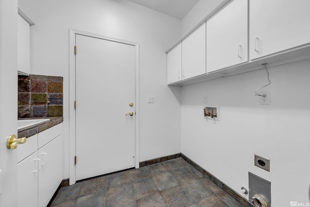 6841 Talmedge Cir, Sparks, NV 89436 - laundry room featuring cabinet space, hookup for an electric dryer, stone finish floors, washer hookup, and baseboards