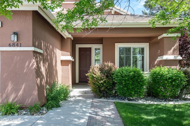 6841 Talmedge Cir, Sparks, NV 89436 - entrance to property featuring stucco siding