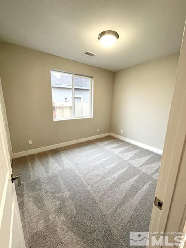 1608 Delta Downs Dr Unit 61, Minden, NV 89423 - empty room with carpet floors and baseboards