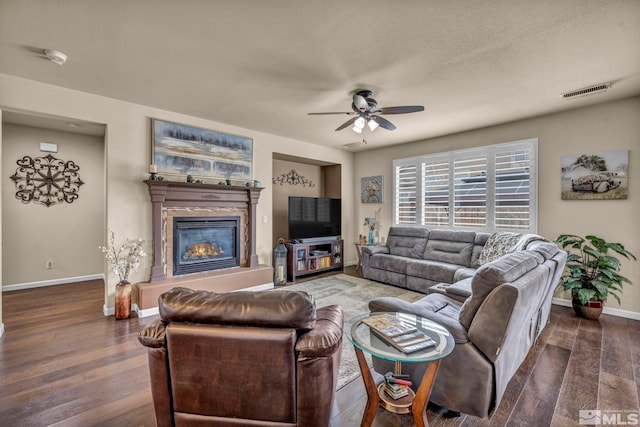 132 Egan Ave, Dayton, NV 89403 - living area with ceiling fan, baseboards, wood finished floors, and a textured ceiling