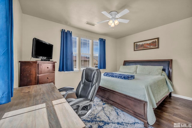 132 Egan Ave, Dayton, NV 89403 - bedroom with wood finished floors, an office area, baseboards, and a ceiling fan