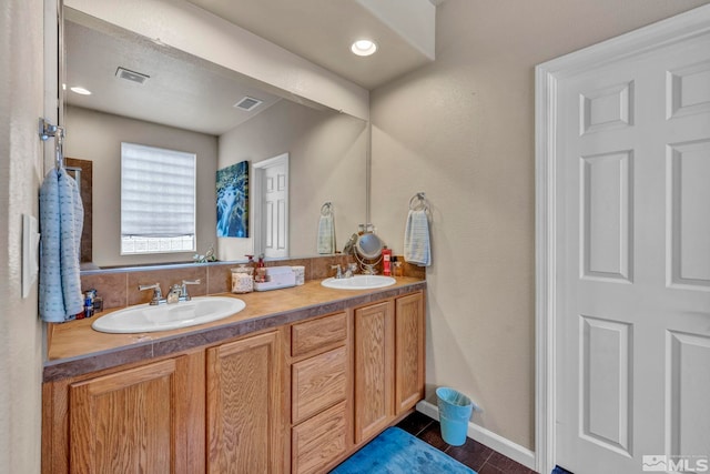 132 Egan Ave, Dayton, NV 89403 - full bathroom featuring tile patterned floors and double vanity