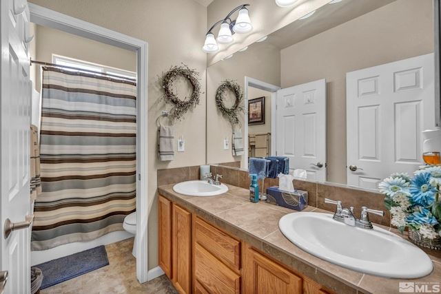 132 Egan Ave, Dayton, NV 89403 - bathroom featuring toilet, double vanity, and a shower with shower curtain
