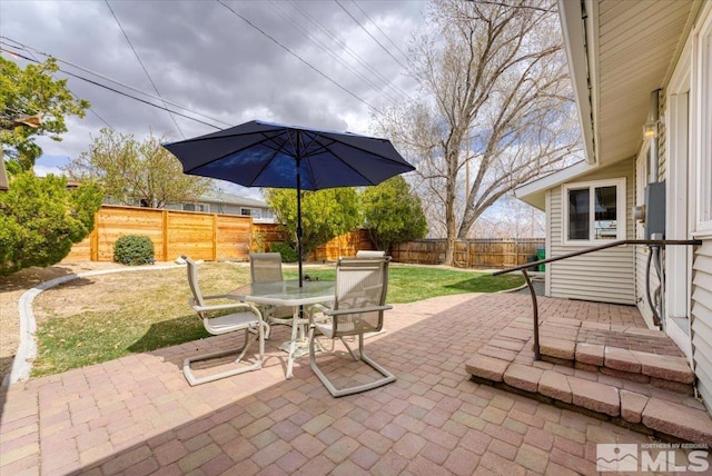 view of patio featuring outdoor dining space