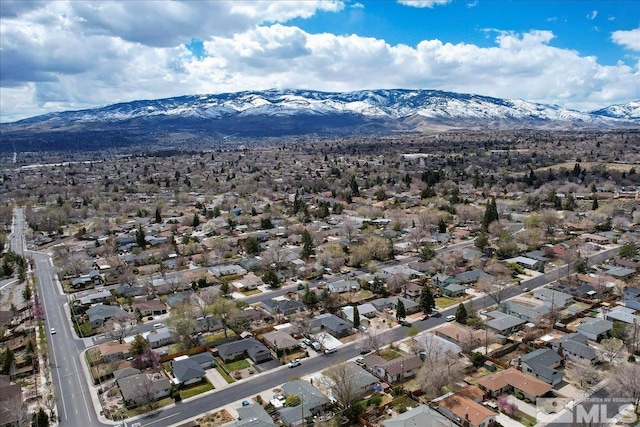 aerial perspective of suburban area with a mountainous background