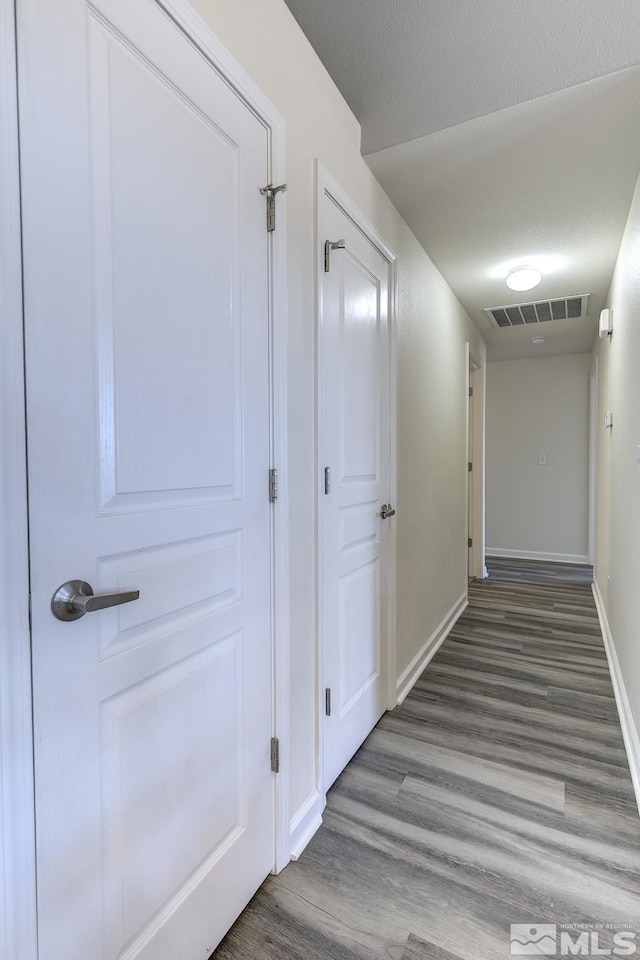 261 Brent St, Fallon, NV 89406 - hall with wood finished floors and baseboards