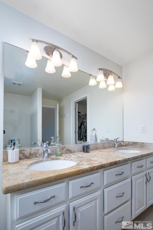 261 Brent St, Fallon, NV 89406 - full bathroom with double vanity and a spacious closet